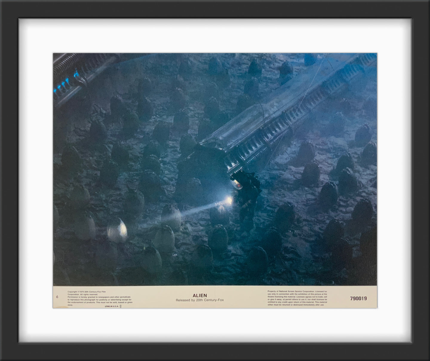 An original 11x14 lobby card for the Ridley Scott film Alien