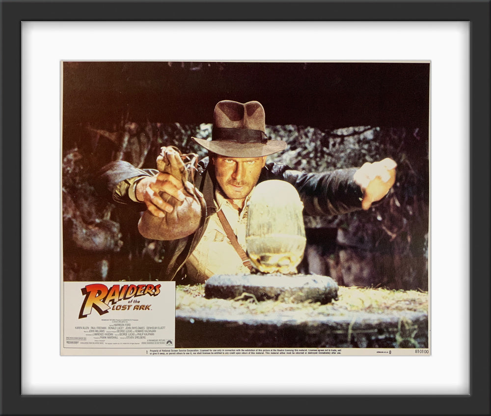 An original 11x14 lobby card for the film Raider of the Lost Ark
