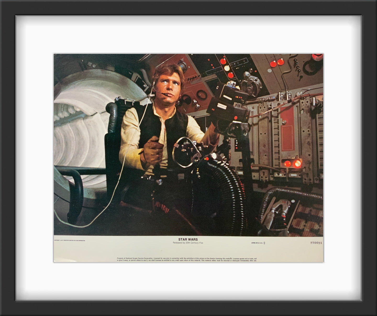 An original 11x14 lobby card for the George Lucas film Star Wars (1977)