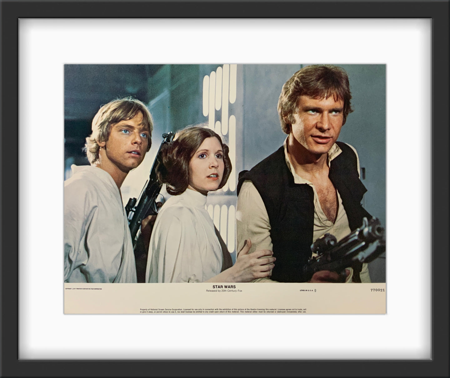 An original 11x14 lobby card for the George Lucas film Star Wars (1977)