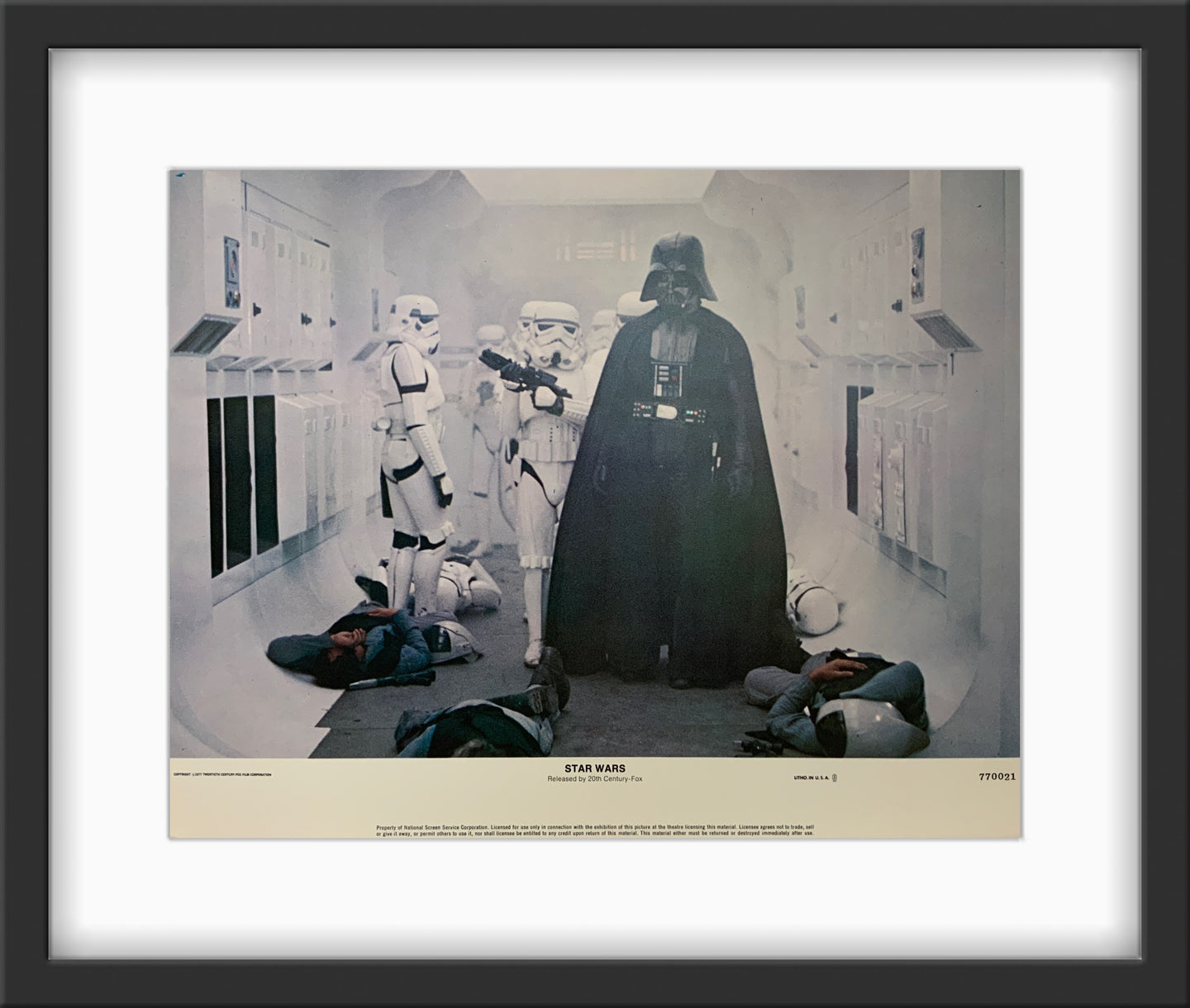 An original 11x14 lobby card for the George Lucas film Star Wars (1977)