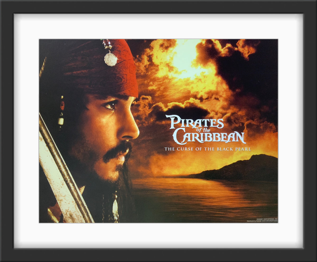 An original lobby card for the film Pirates of the Caribbean: The Curse of the Black Pearl