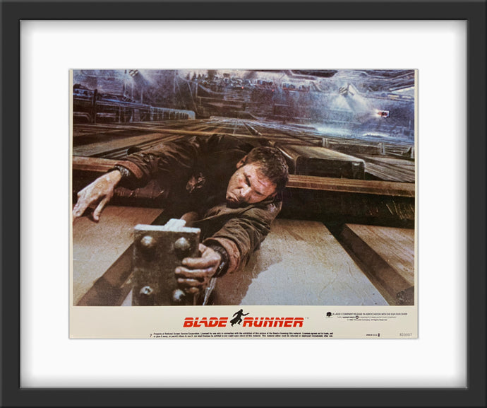 An original 11x14 lobby card from the Ridley Scott film Bladerunner