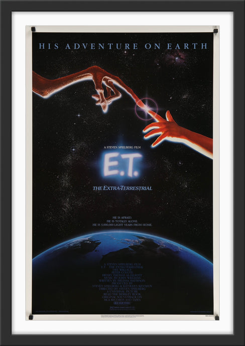 An original movie poster for the film E.T. The Extra Terrestrial