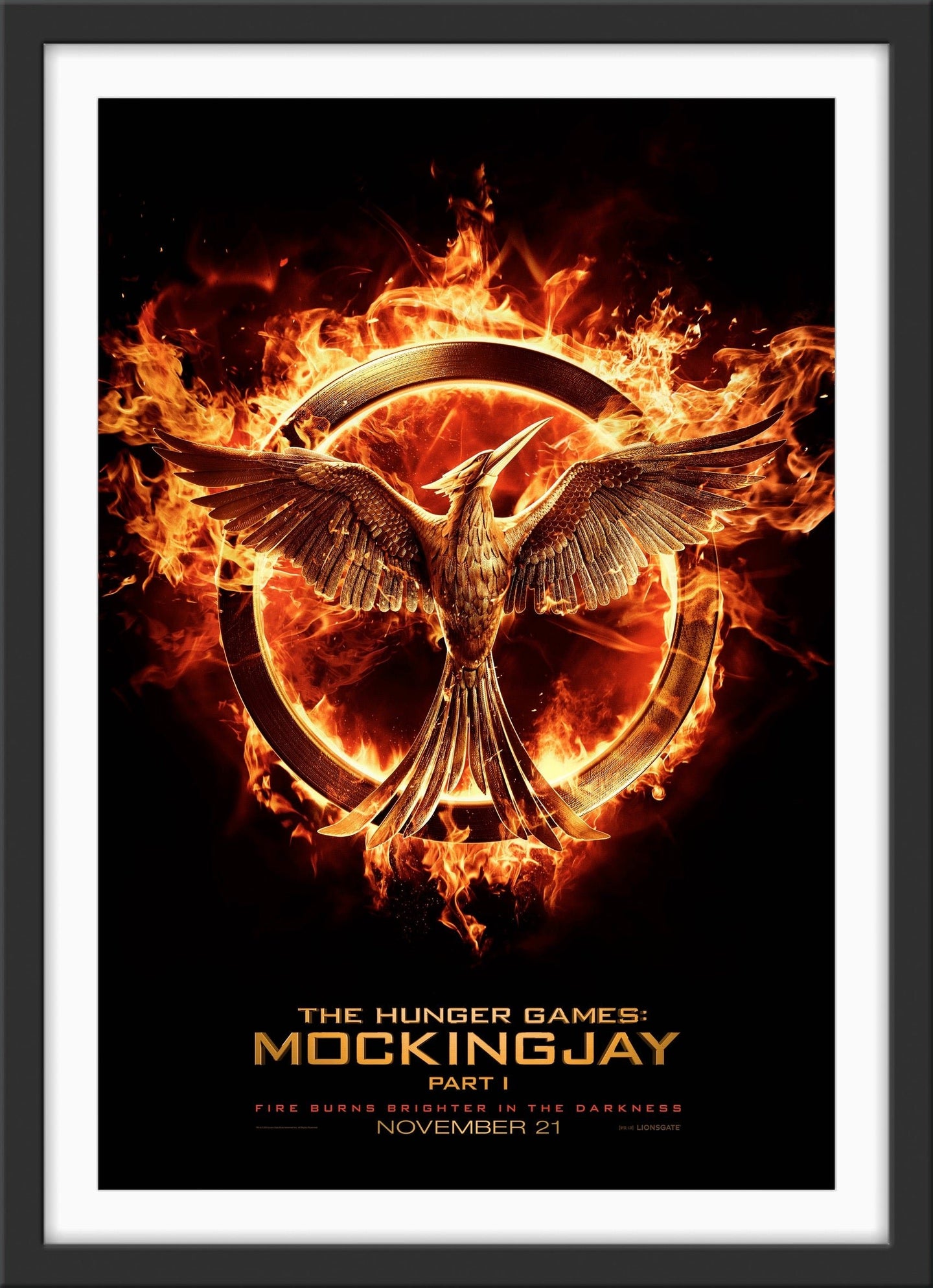An original movie poster for the film The Hunger Games: Mockingjay Part 1