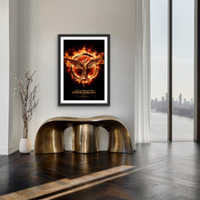 Load image into Gallery viewer, An original movie poster for the film The Hunger Games: Mockingjay Part 1