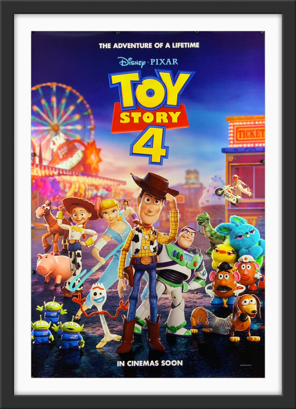 An original movie poster for the Disney / Pixar film Toy Story 4