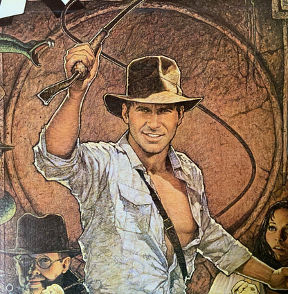 An original movie poster with art by Richard Amsel for the film Raiders of the Lost Ark
