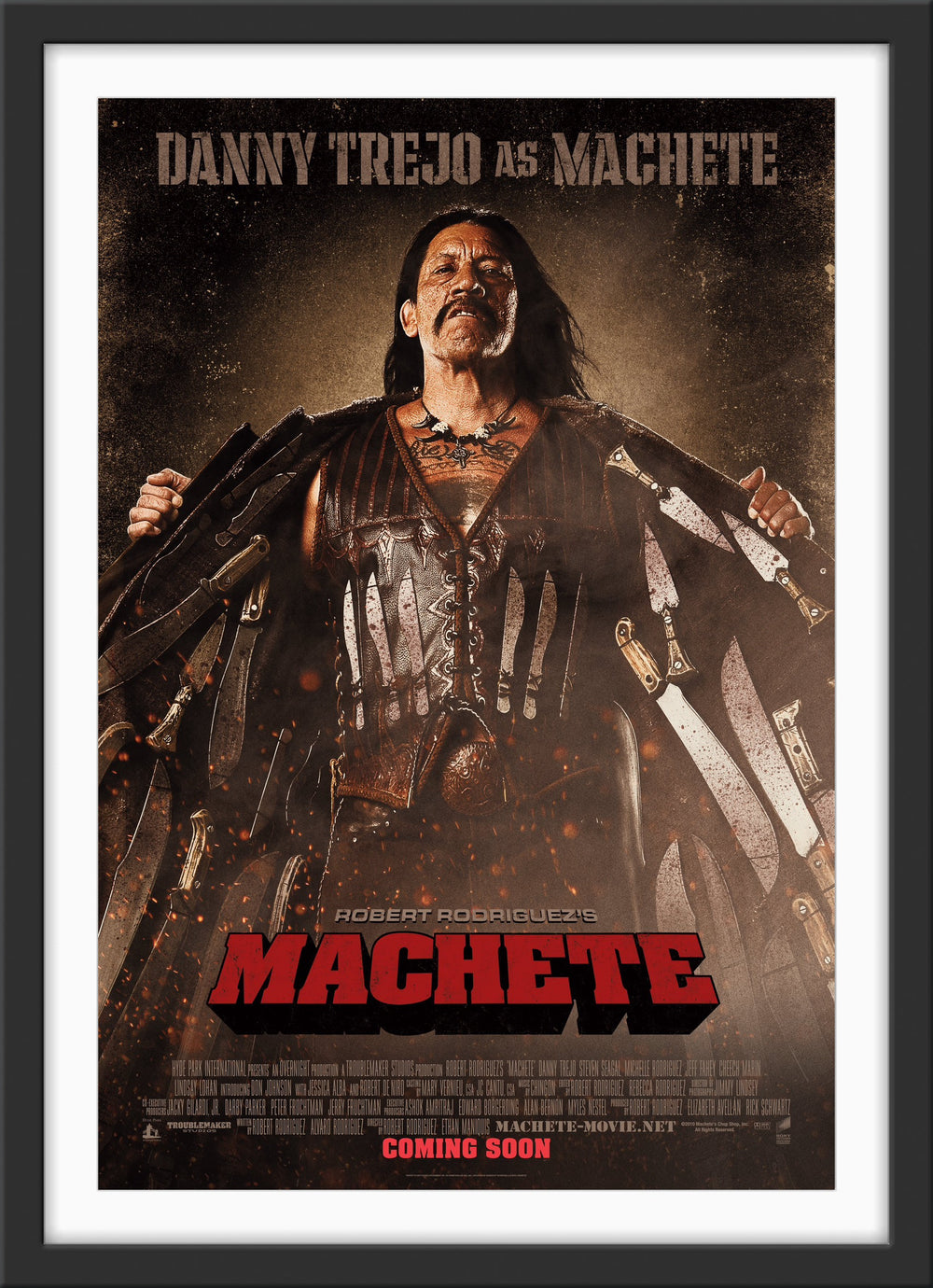 An original movie poster for the Robert Rodriguez film Machete