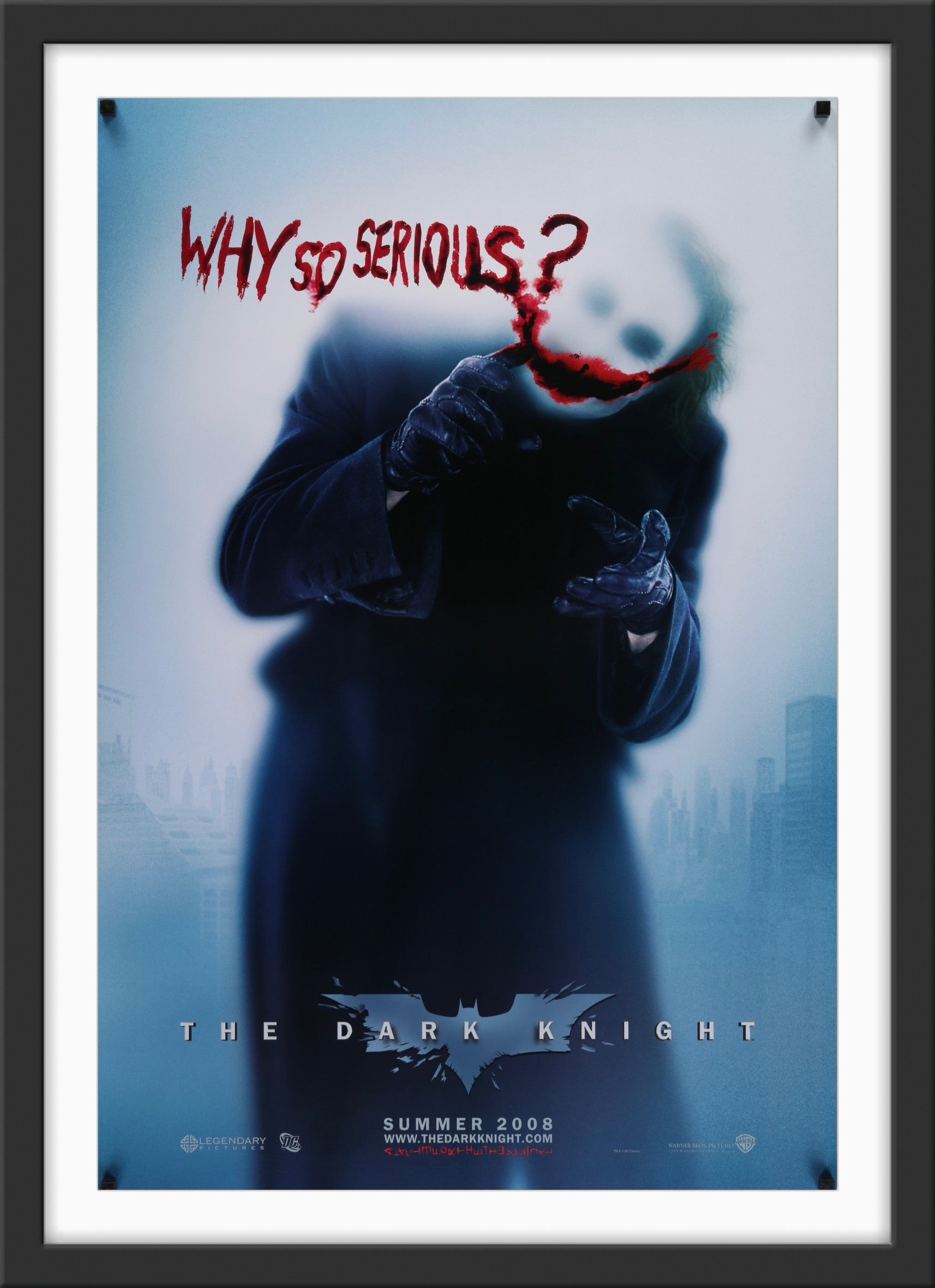 An original movie poster with Heath Ledger as the Joker for the Batman film The Dark Knight