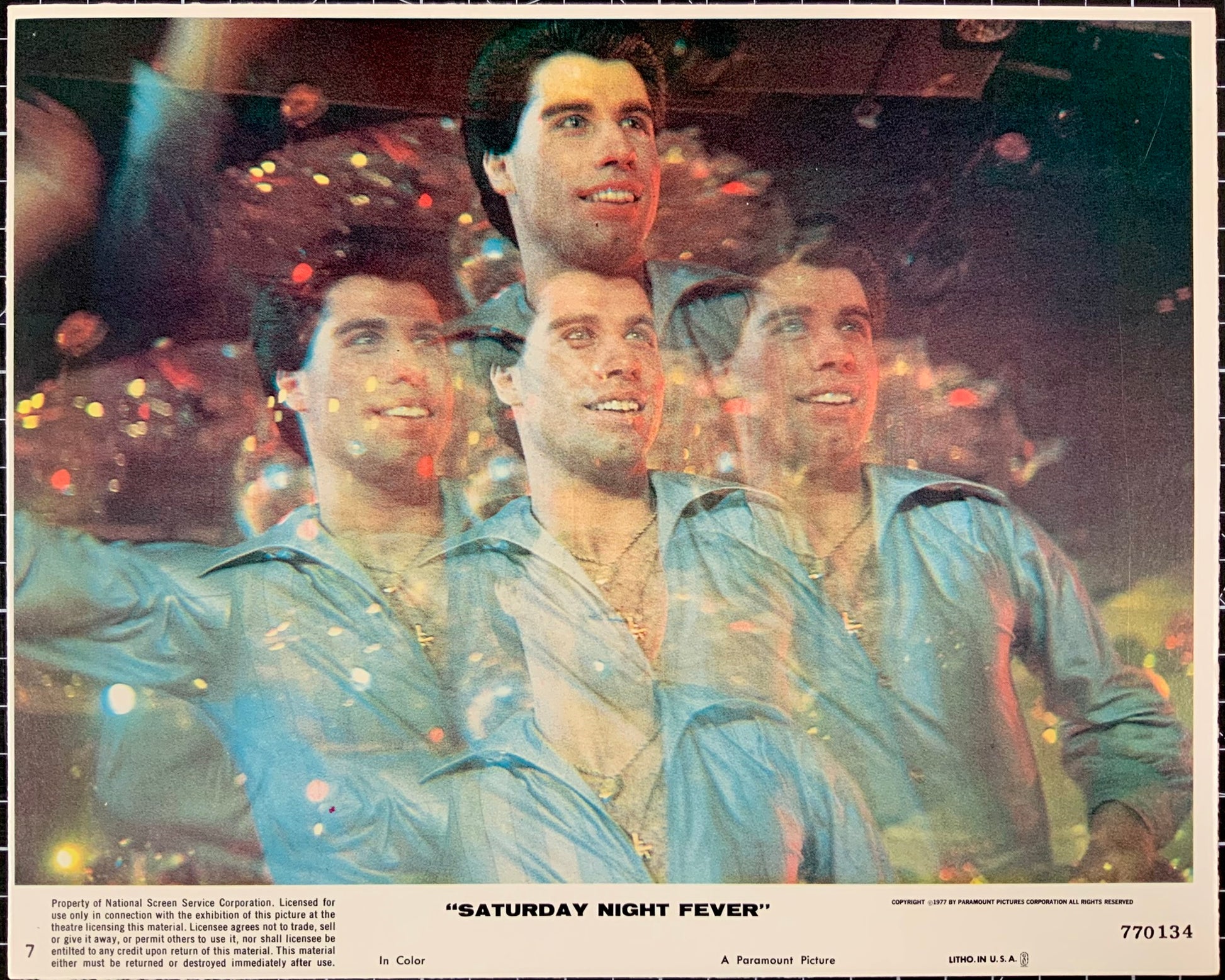 An original 8x10 lobby card for the John Travolta film Saturday Night Fever