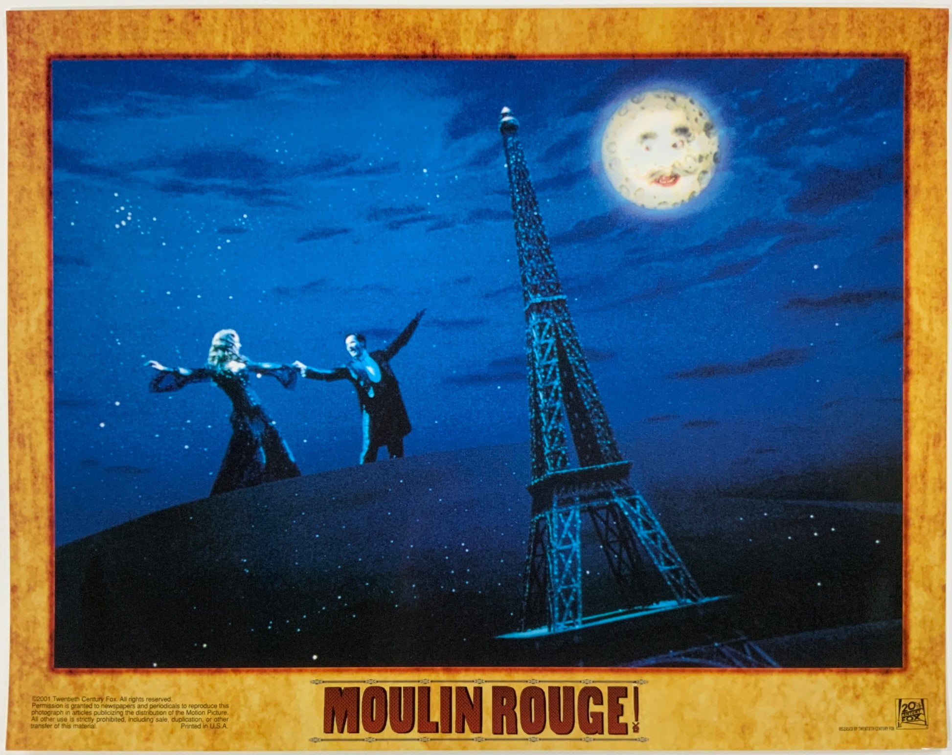 An original 11x14 lobby card for the film Moulin Rouge!