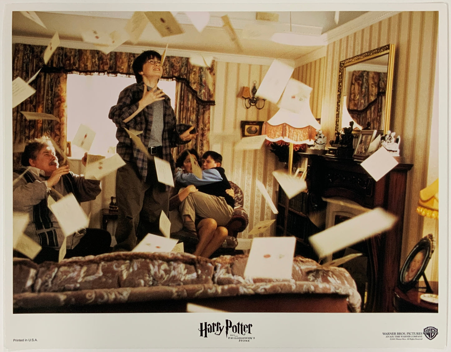 An original 11x14 lobby card for the Wiazrding World film Harry Potter and the Philosopher's Stone