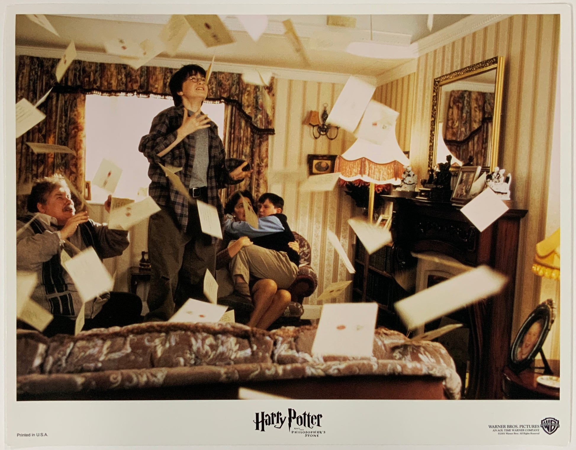 An original 11x14 lobby card for the Wiazrding World film Harry Potter and the Philosopher's Stone
