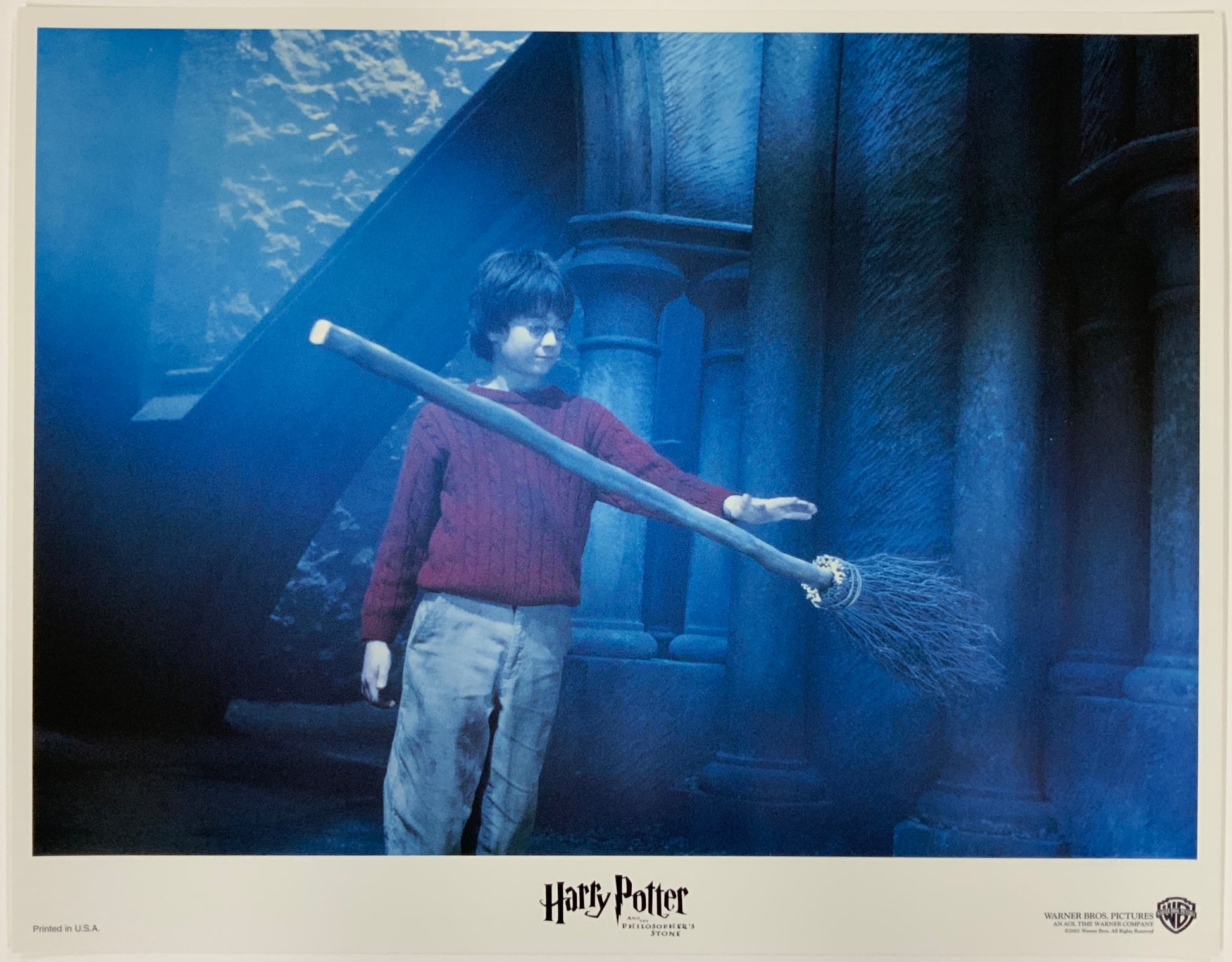 An original 11x14 lobby card for the Wizarding World film Harry Potter and the Philosopher's Stone