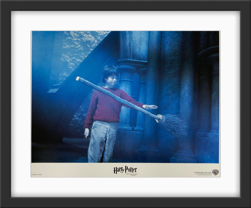 An original 11x14 lobby card for the Wizarding World film Harry Potter and the Philosopher's Stone