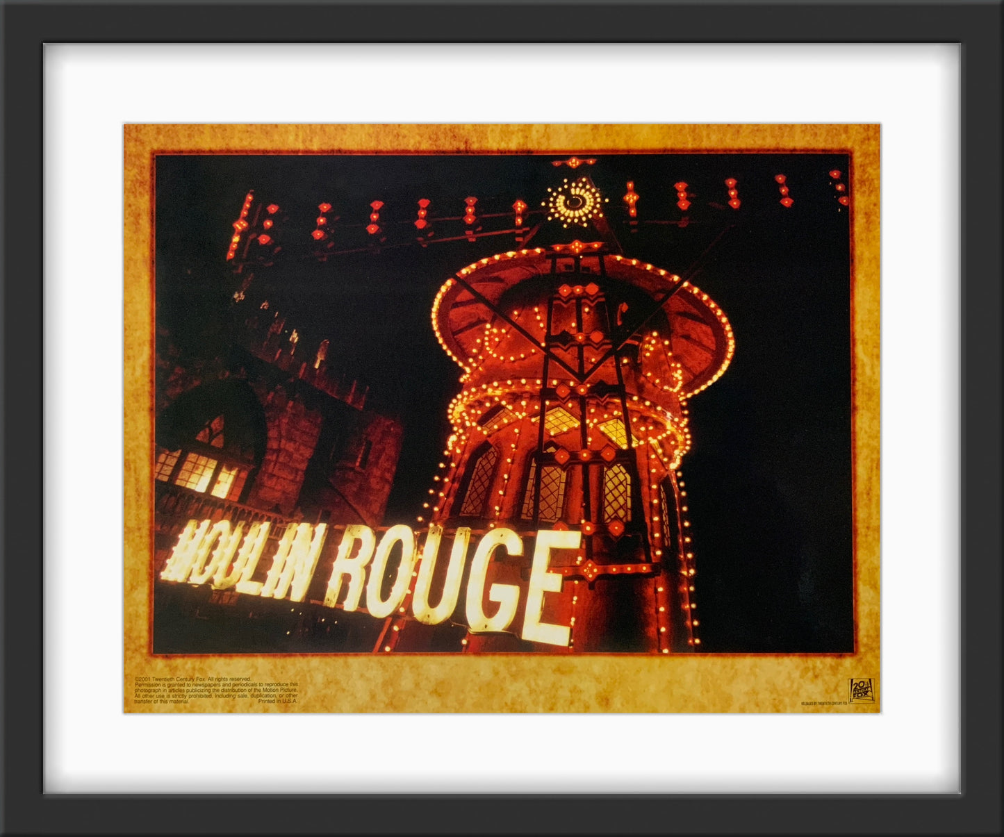 An original 11x14 lobby card for the film Moulin Rouge!