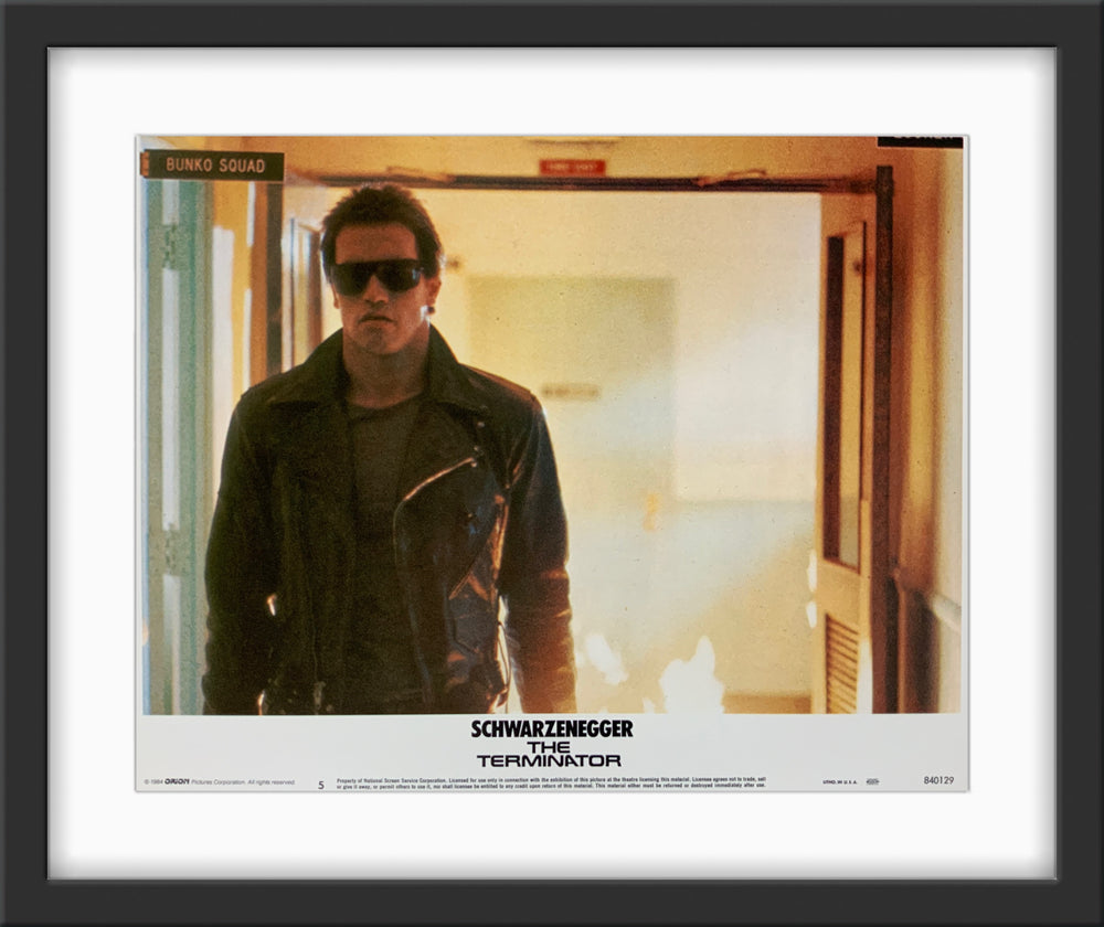 An original 11x14 lobby card for the film The Terminator