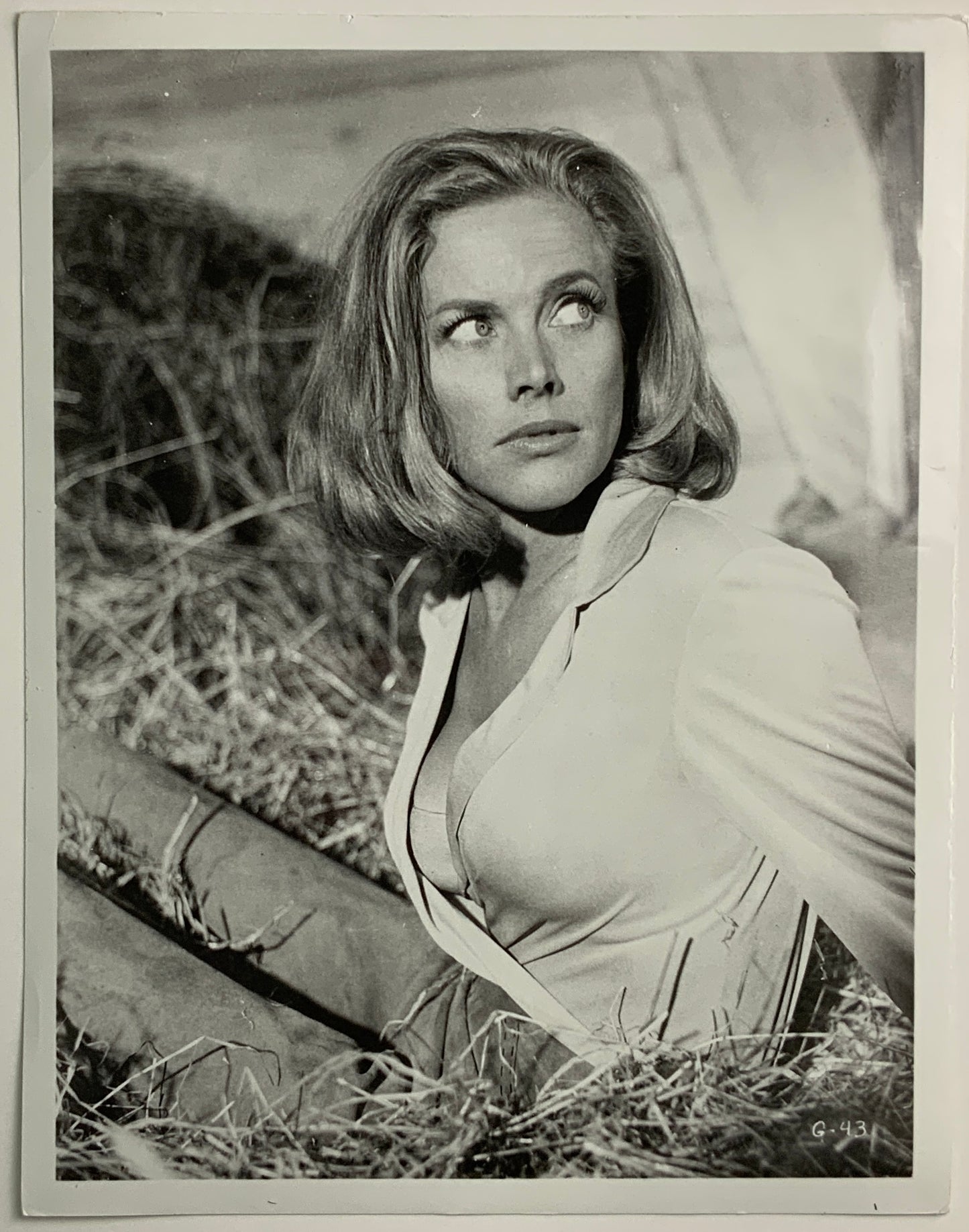 An original 8x10 movie still of Honor Blackman as Pussy Galore in the James Bond film Goldfinger