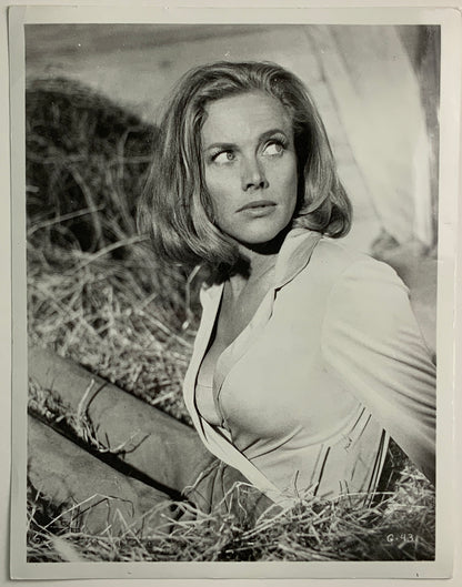 An original 8x10 movie still of Honor Blackman as Pussy Galore in the James Bond film Goldfinger
