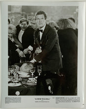 Load image into Gallery viewer, An original 8x10 movie still from the James Bond film A View To A Kill