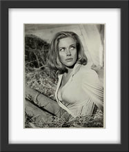 Load image into Gallery viewer, An original 8x10 movie still of Honor Blackman as Pussy Galore in the James Bond film Goldfinger