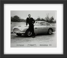 Load image into Gallery viewer, An original movie still from the James Bond film Goldfinger