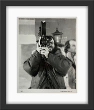 Load image into Gallery viewer, An original candid still of Stanley Kubrick from the filming of The Shining