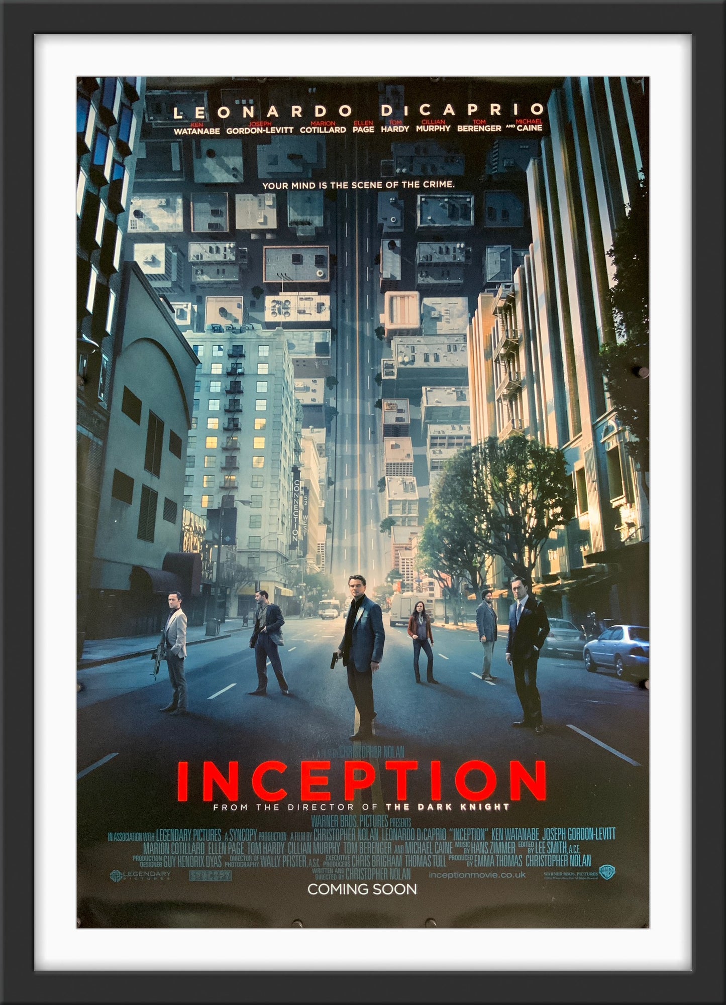 An original movie poster for the Christopher Nolan film Inception