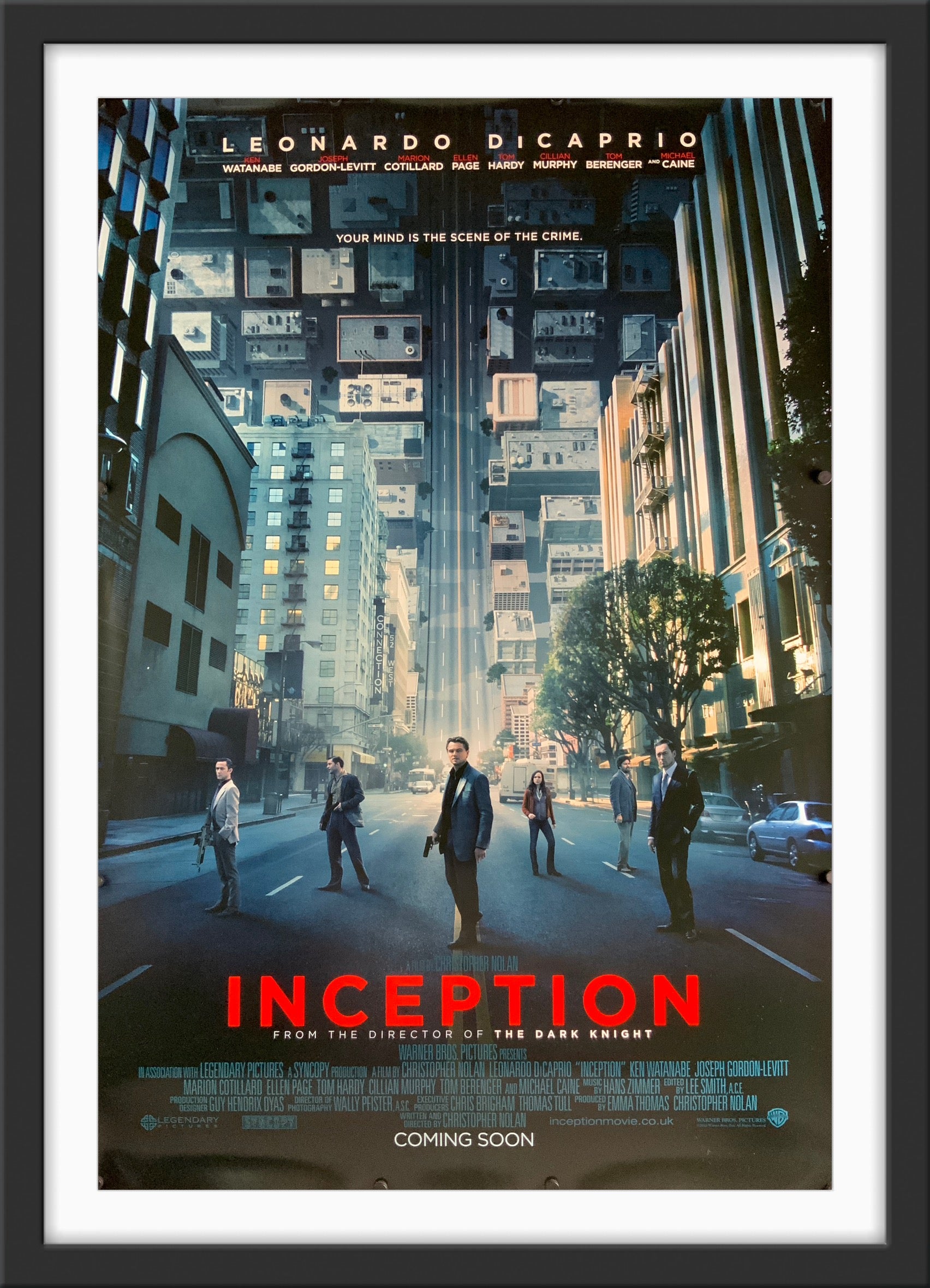 An original movie poster for the Christopher Nolan film Inception