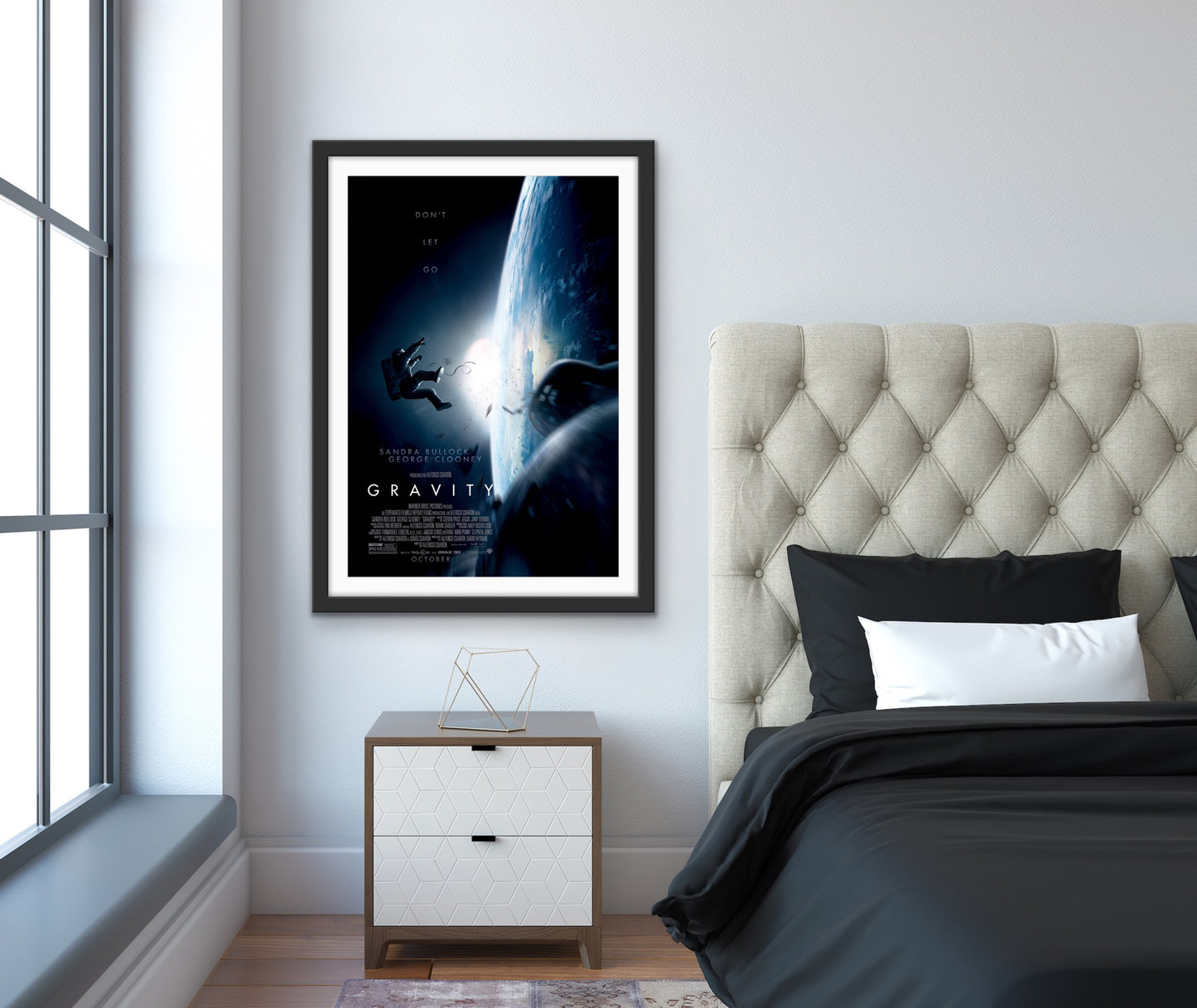 An original movie poster for the Sandra Bullock film Gravity