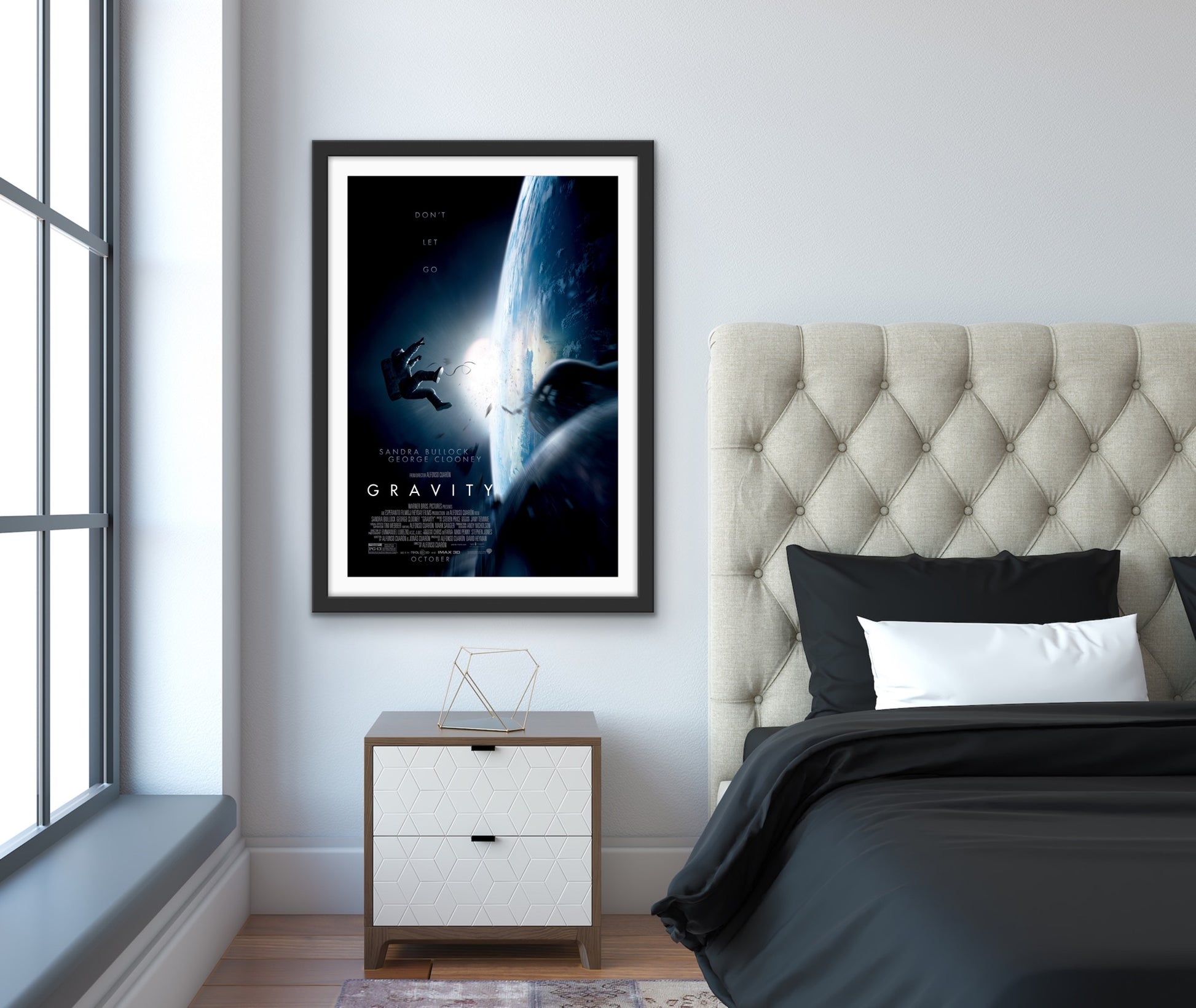 An original movie poster for the Sandra Bullock film Gravity