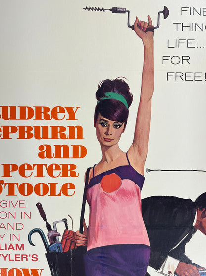 An original movie poster for the Audrey Hepburn film How To Steal A Million