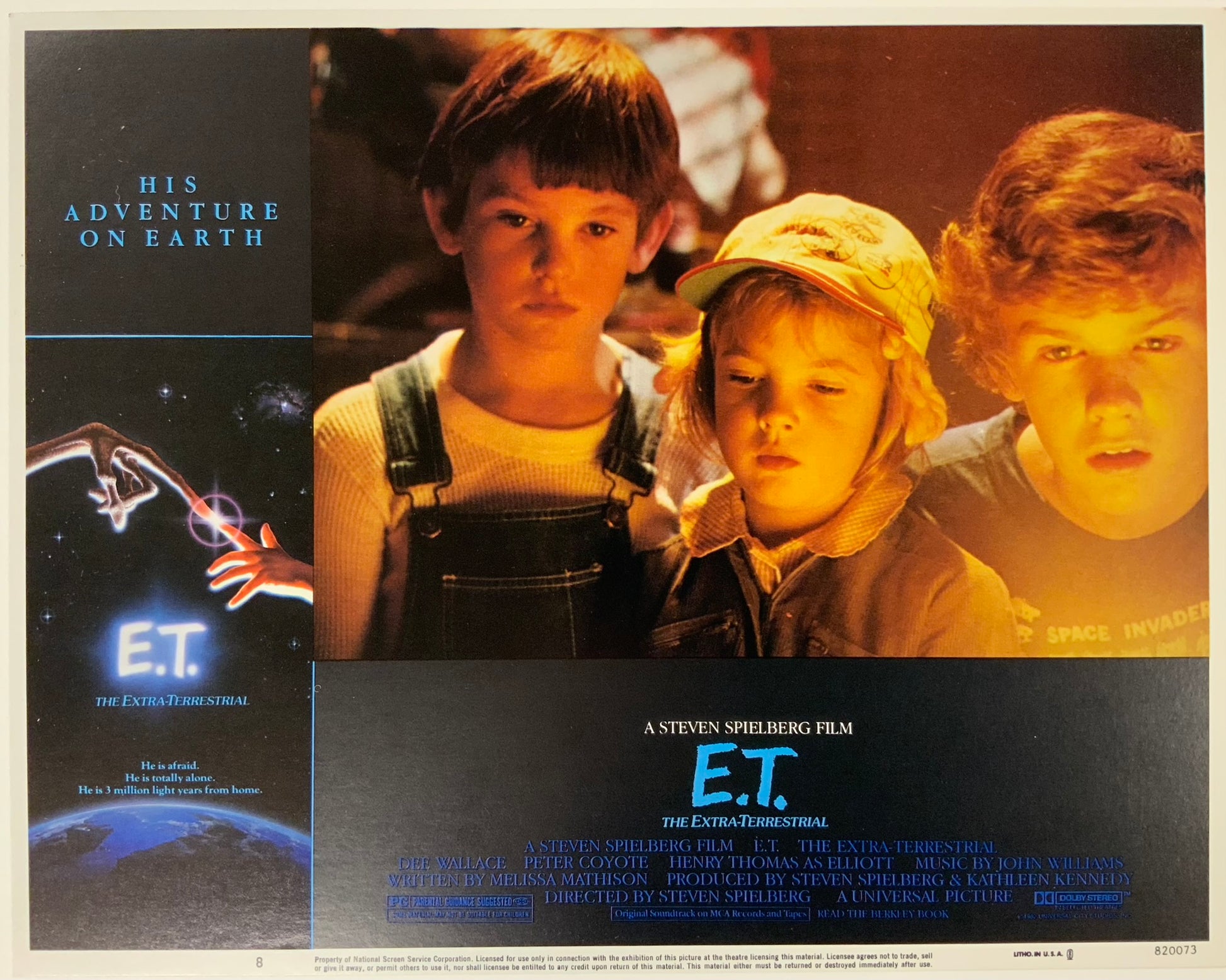 An original 11x14 lobby card for the Stephen Spielberg film E.T. The Extra Terrestrial