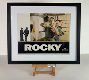 An original 11x14 lobby card for the film Rocky