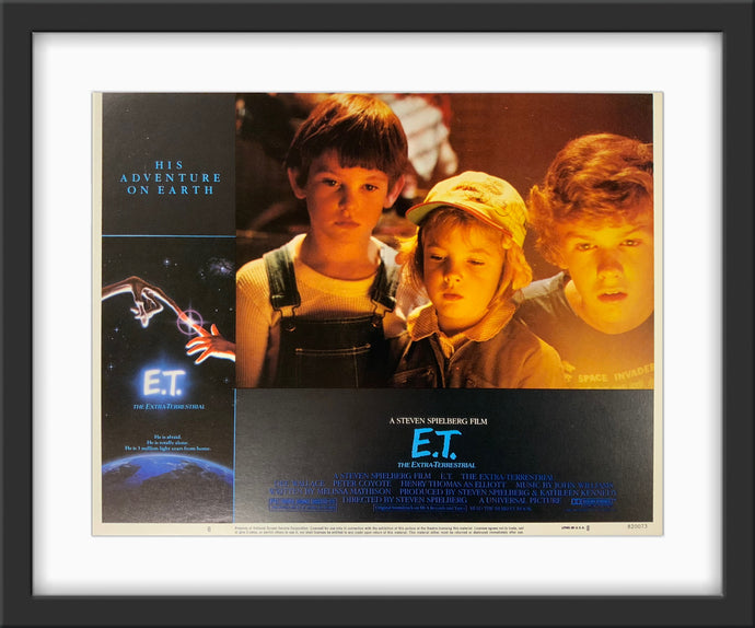 An original 11x14 lobby card for the Stephen Spielberg film E.T. The Extra Terrestrial