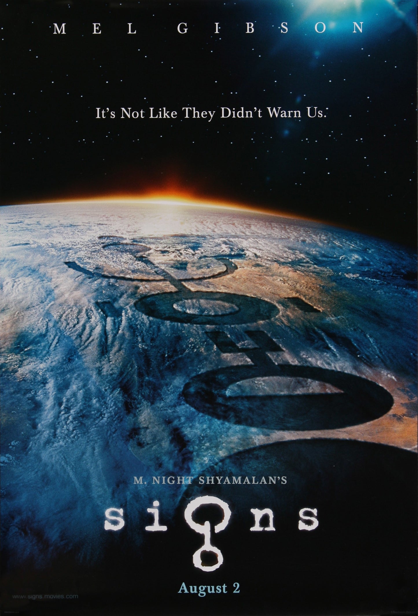 An original movie poster for the M. Night Shyalmalan film Signs