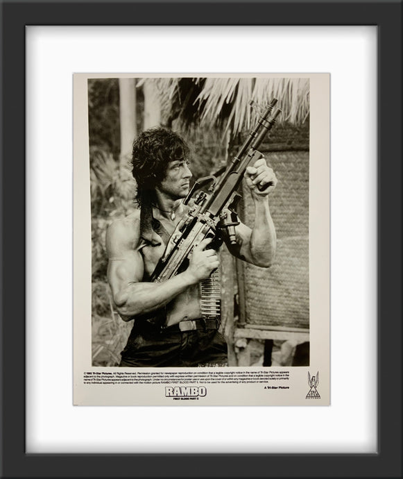 An original and framed 8x10 movie still for the Sylevester Stallone film Rambo First Blood Part 2