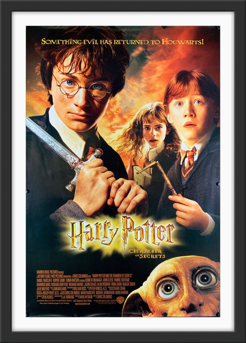 An original movie poster for the film Harry Potter and Chanber of Secrets