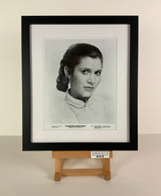 Load image into Gallery viewer, An original 8x10 still of CArrier Fisher for the Star Wars film The Empire Strikes Back