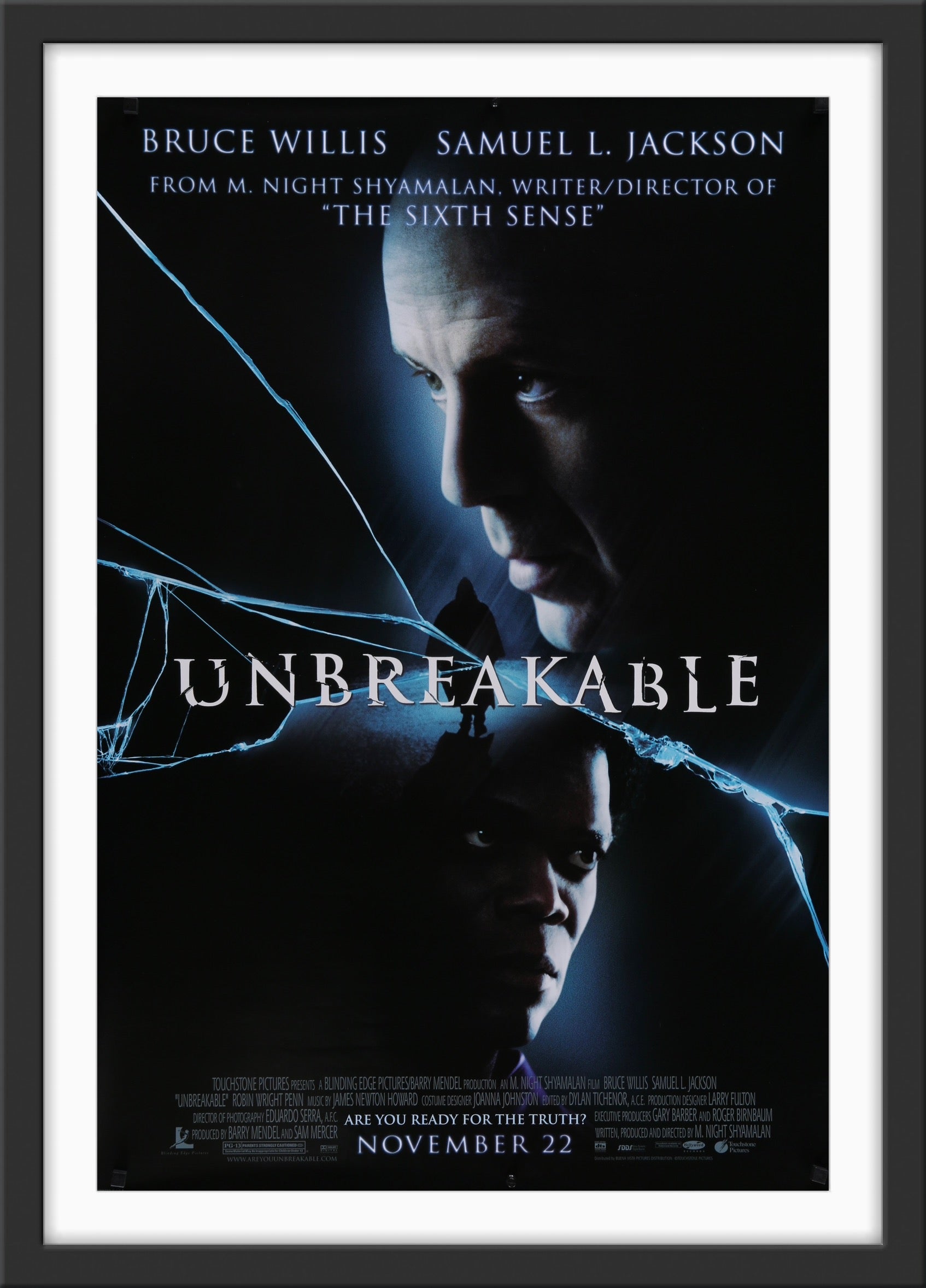 An original movie poster for the M. Night Shyamalan film Unbreakablefilm