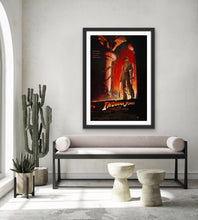 Load image into Gallery viewer, An original movie poster for the film Indiana Jones and the Temple of Doom