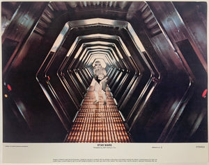 An original 11x14 lobby card / movie poster for the 1977 film Star Wars / A New Hope