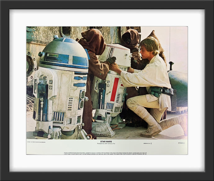 An original 11x14 lobby card/ movie poster for the film Star Wars / A New Hope