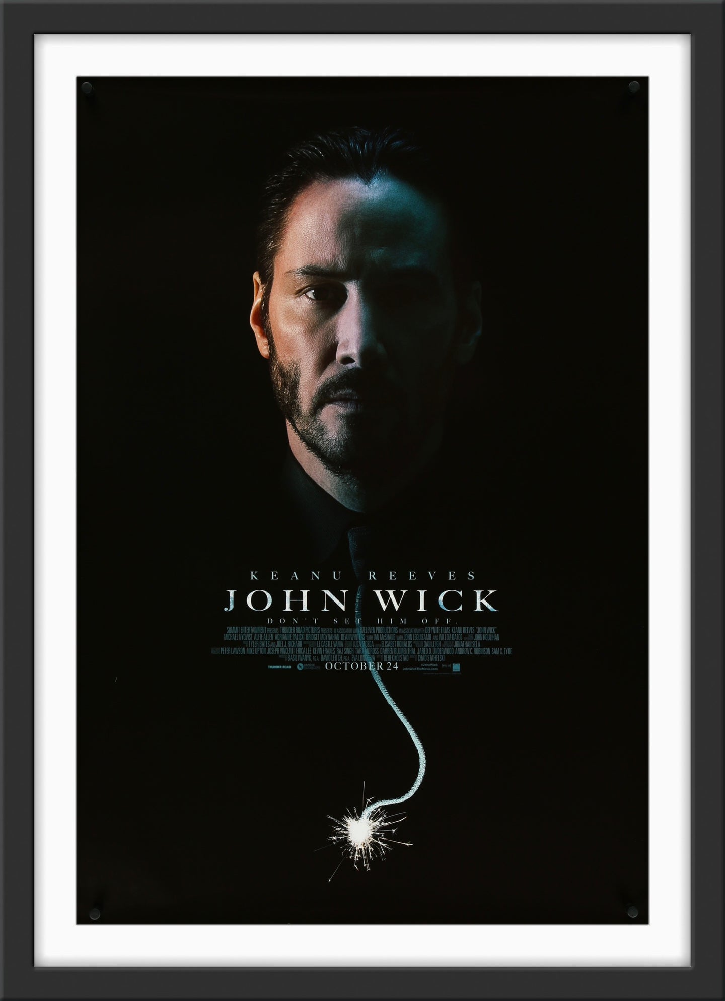 An original movie poster for the Keanu Reeves film John Wick