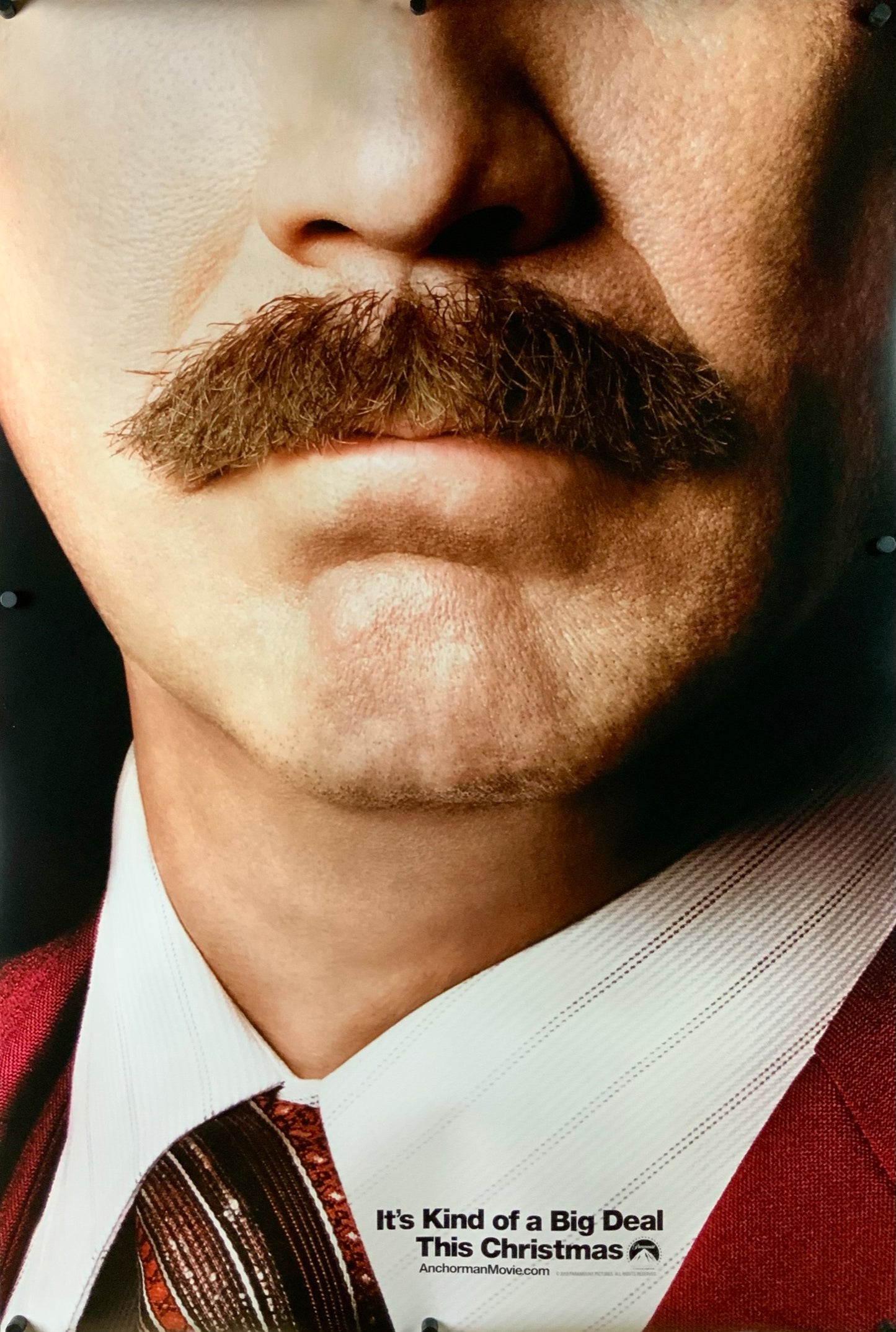 An original teaser movie poster for the film Anchorman: The Legend Continues
