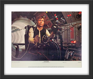 An original 11x14 lobby card / movie poster for the film Star Wars