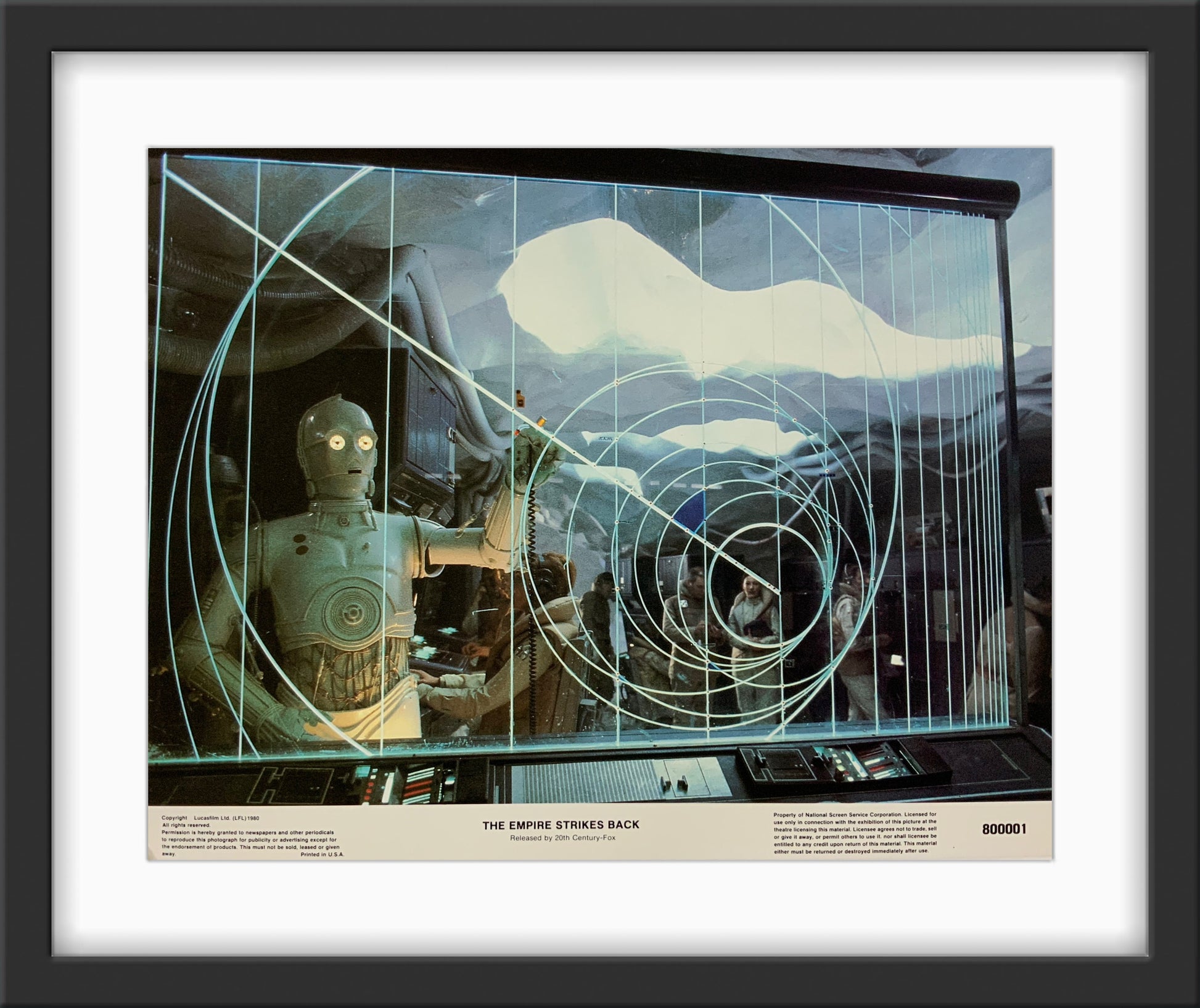 An original 11x14 lobby card for the Star Wars film The Empire Strikes Back
