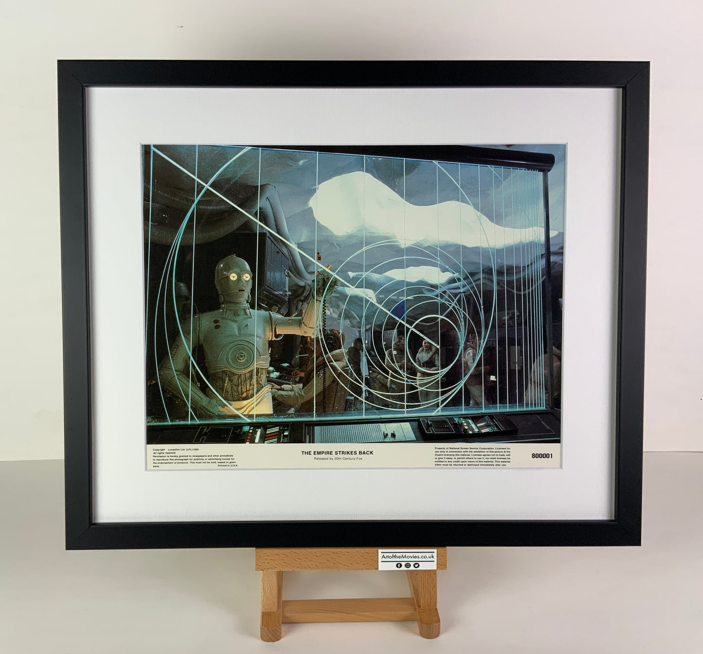 An original 11x14 lobby card for the Star Wars film The Empire Strikes Back