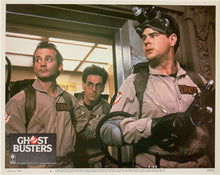 Load image into Gallery viewer, An original 11x14 lobby card for the film Ghostbusters
